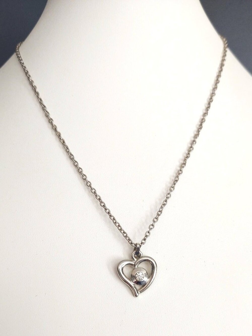 Silver heart pendant necklace with faux diamond